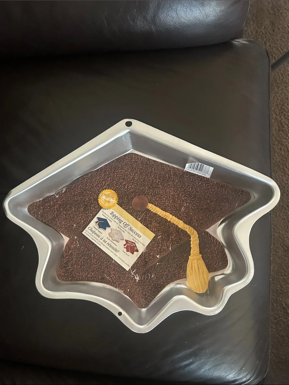 Wilton Silver Graduation Cap Cake Pan with Yellow Tassel Accent